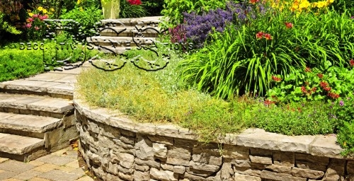 What are some common applications of decorative stone in landscape design?